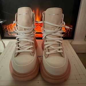 Pink Alexander McQueen boots very stylish runs small.